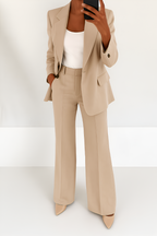 Women's two-piece suit set in beige with tailored blazer, styled for work and smart-casual outfits.