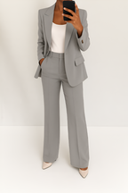 Women's two-piece suit set in grey with tailored blazer, styled for work and smart-casual outfits.