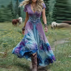 Women's boho dress in blue with floral print, styled for casual and smart-casual outfits.