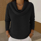 Women's waffle knit jumper in black with cowl neck, styled for casual and smart-casual outfits.