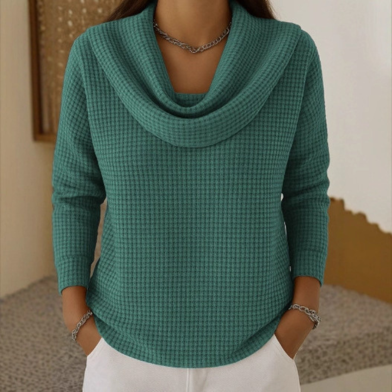 Women's waffle knit jumper in green with cowl neck, styled for casual and smart-casual outfits.